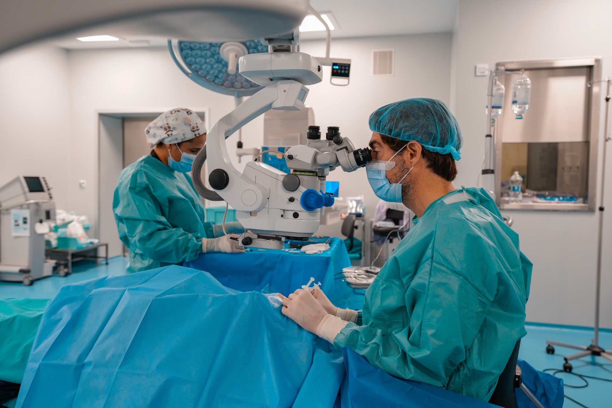 Ophthalmic surgeon and nurse in the operating room